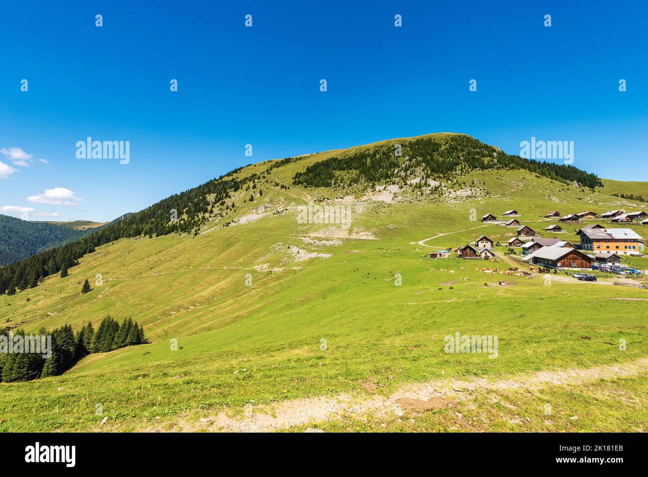 Village and Osternig or Oisternig mountain peak, Carnic Alps, Feistritz an der Gail municipality, Austria, Carinthia, Europe. Italy-Austria Border. Stock Photo