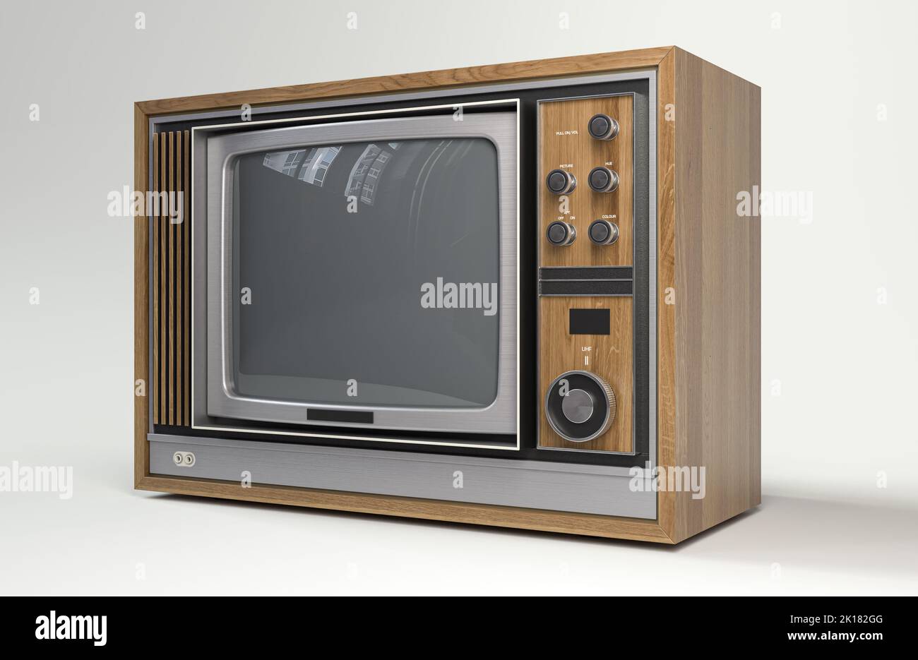 A concept vintage tv from the seventies made of plastic chrome and wood on an isolated white studio background - 3D render Stock Photo