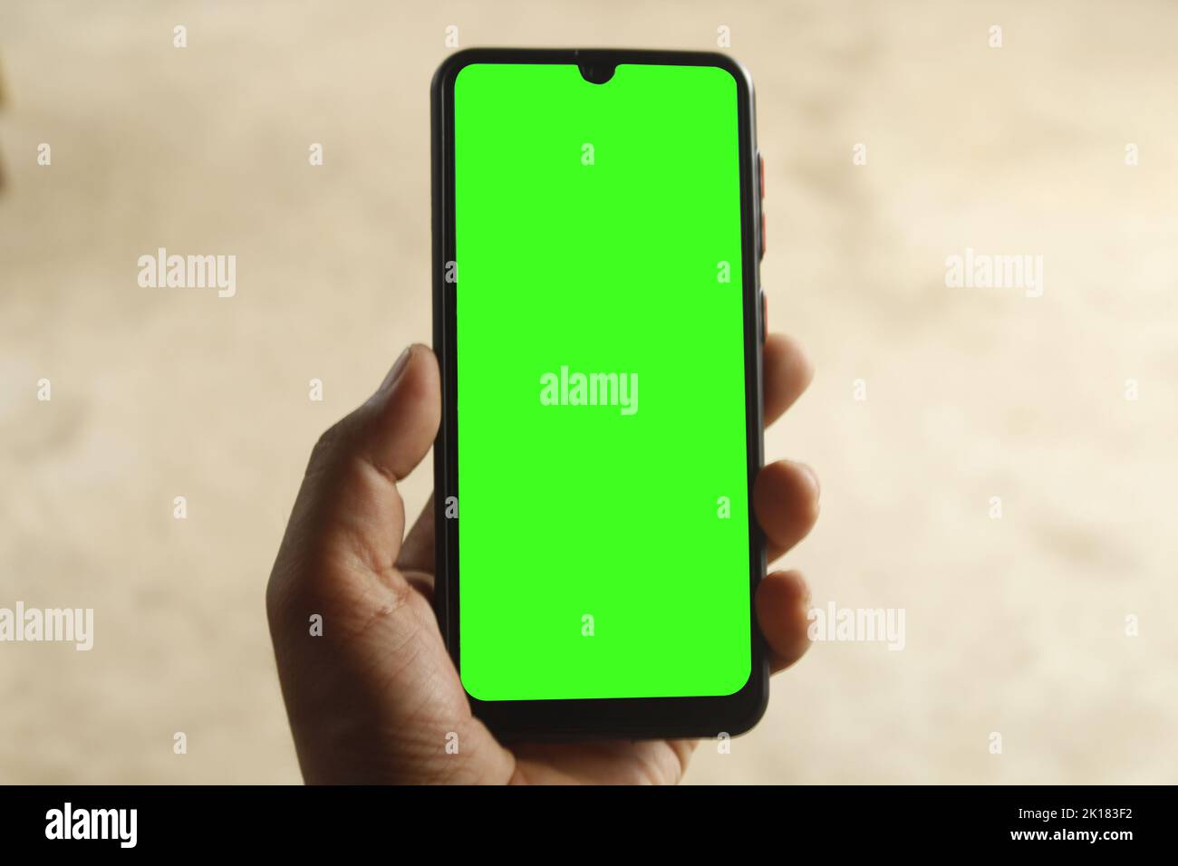 A guy is catching a phone , Phone green screen , man using a phone green screen Stock Photo
