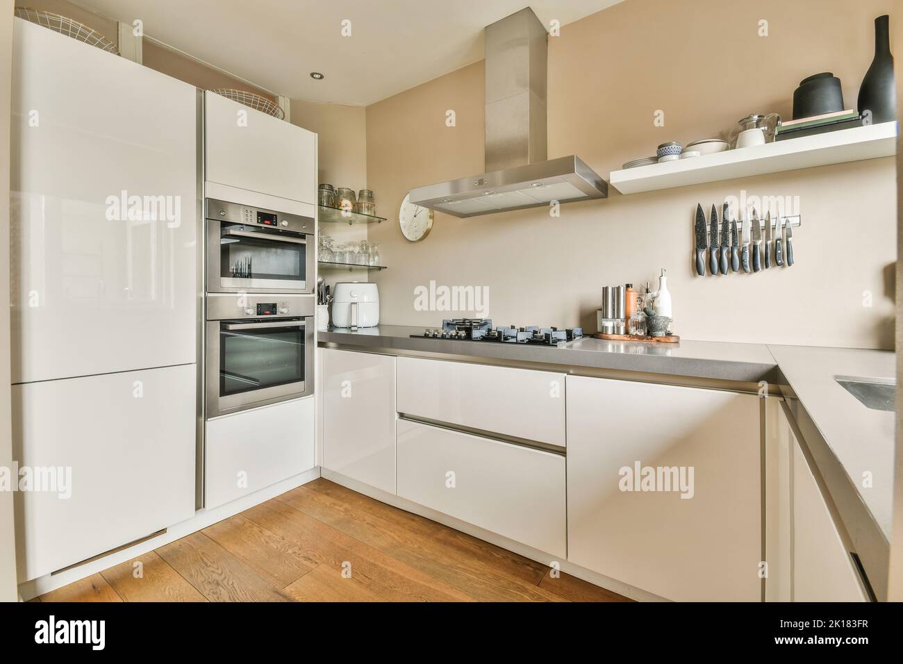 Modern white Kitchen Counter and Kitchen Equipment in Luxurious Apartment.  small kitchen counter ideas in the residential Stock Photo - Alamy
