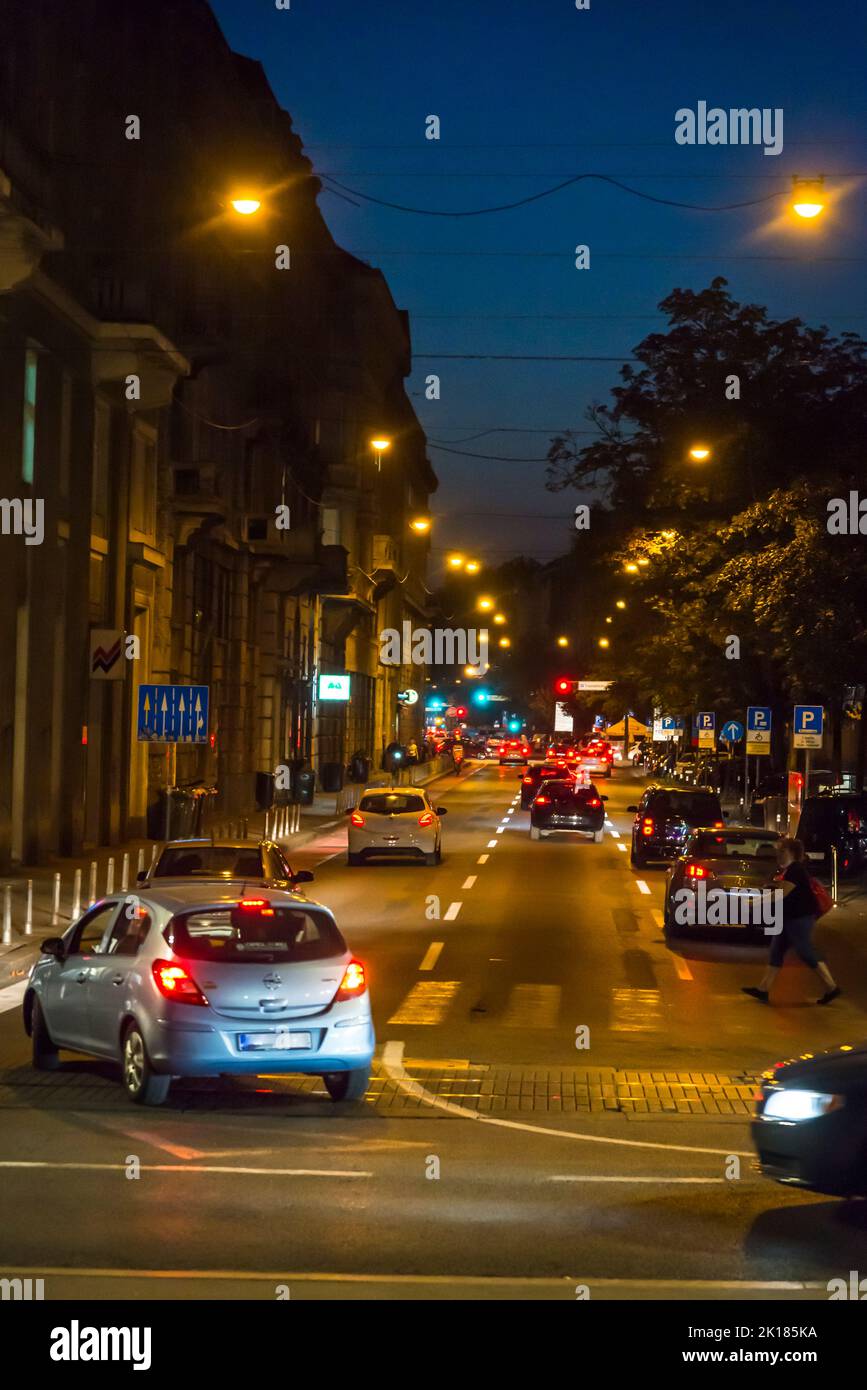 One-way traffic on Kneza Mislava street at night, Zagreb, Croatia Stock Photo
