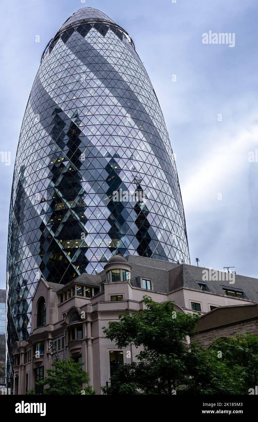 LONDON, ENGLAND - JULY 21st, 2022: View of 30 St Mary Axe or the Ghurkin, iconic new commercial skycraper of London Stock Photo