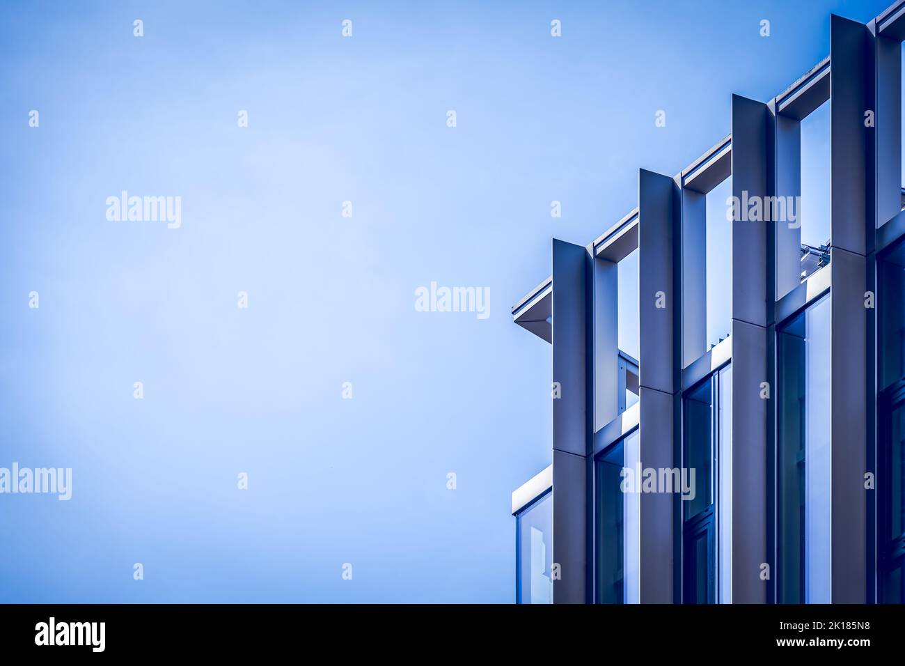 Detail of a modern building against a blue sky, use as a background Stock Photo