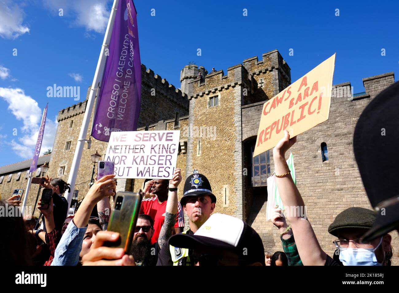 Cardiff Castle, Cardiff, Wales, UK – Friday 16th September 2022 – Protesters hold anti royalist placards outside Cardiff Castle as King Charles III makes his first visit to Wales as the new Monarch. Photo Steven May / Alamy Live News Stock Photo