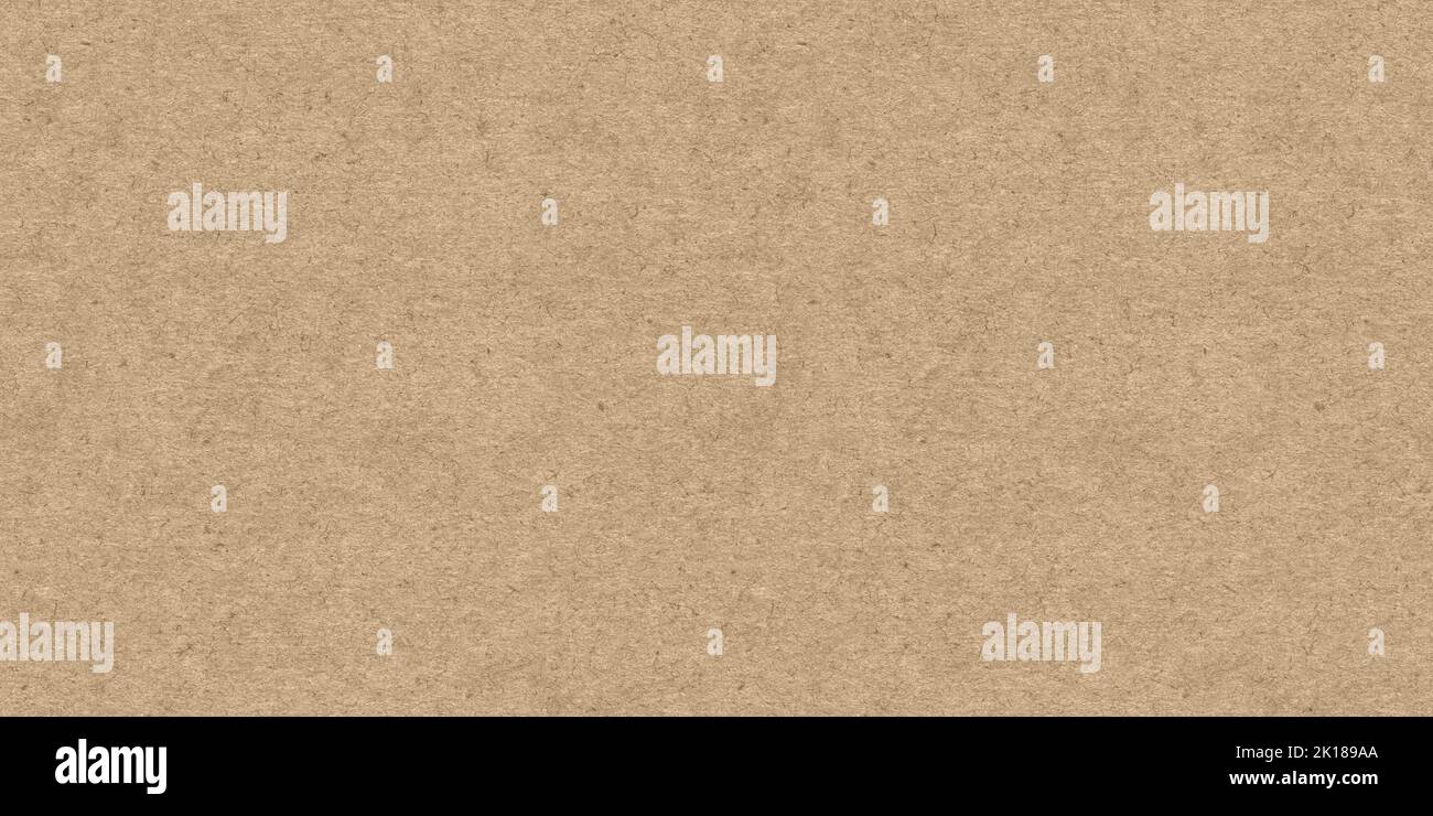 Seamless recycled brown kraft fiber paper background texture. Tileable