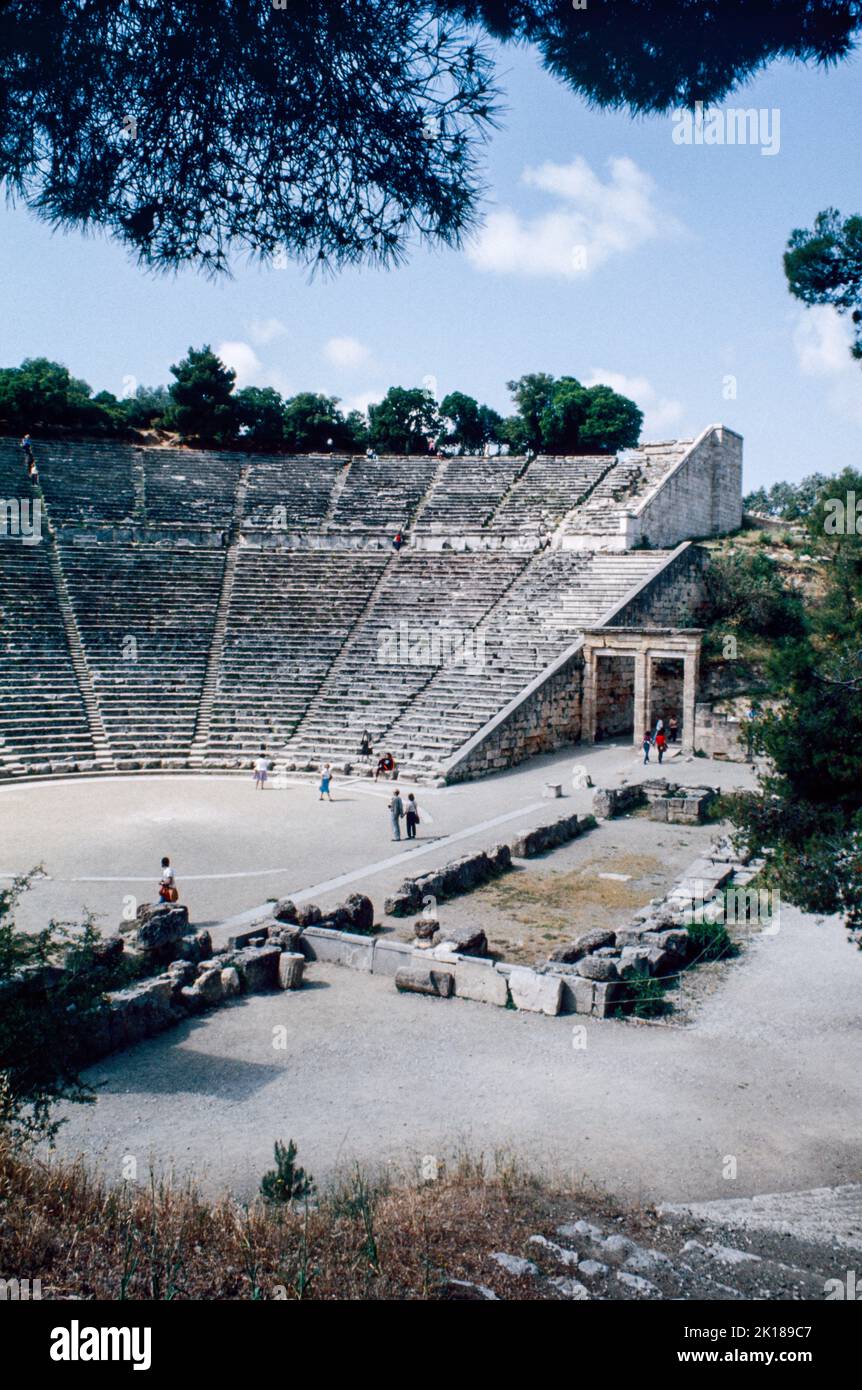 Theatre at Epidaurus - a small city (polis) in ancient Greece, on the Argolid Peninsula at the Saronic Gulf, best known for its ancient Greek sanctuary. March 1980. Archival scan from a slide. Stock Photo