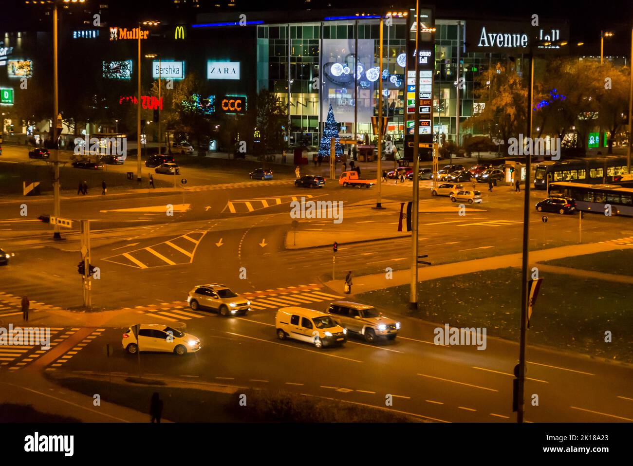 Crossroads in front of Avenue Mall shopping centre at night, Zagreb, Croatia Stock Photo