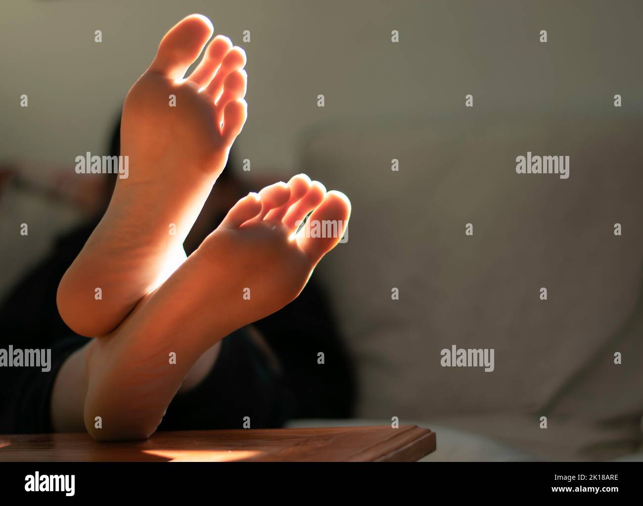Feet on table toes hi-res stock photography and images - Alamy