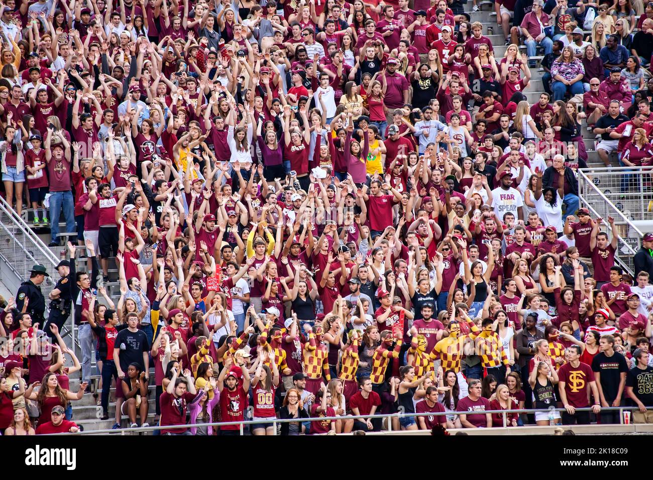 Tallahassee, Florida - November 23, 2013:  Florida State University fans cheering at a FSU Seminole football game in Doak Campbell Stadium Stock Photo