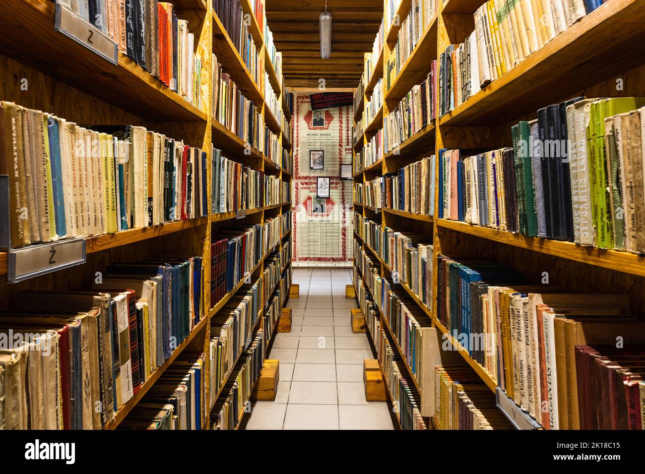 Old vintage books on a wooden shelf in the library Stock Photo Alamy