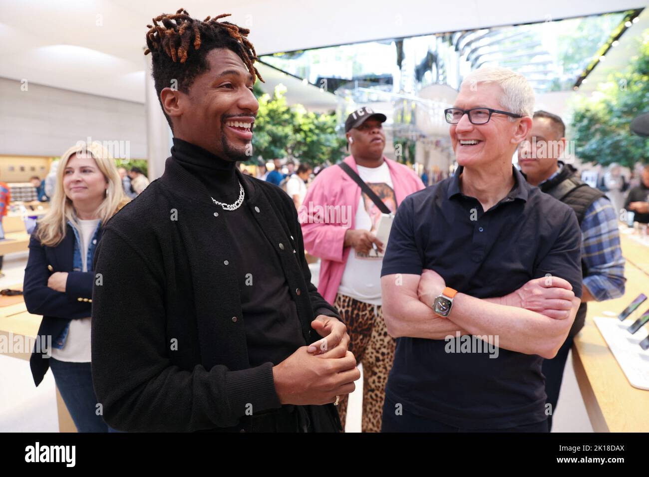 Singer Jon Batiste and Apple CEO Tim Cook speak at the Apple Fifth Avenue store for the release of the Apple iPhone 14 range in Manhattan, New York City, U.S., September 16, 2022.  REUTERS/Andrew Kelly Stock Photo