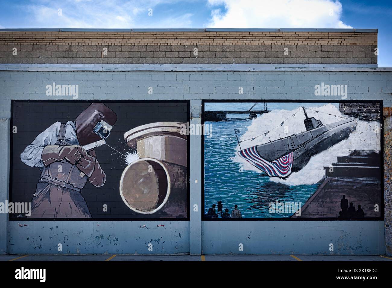 A mural depicts the war effort in which 28 World War Two submarines were built in the shipyards at Manitowoc, Wisconsin. Stock Photo