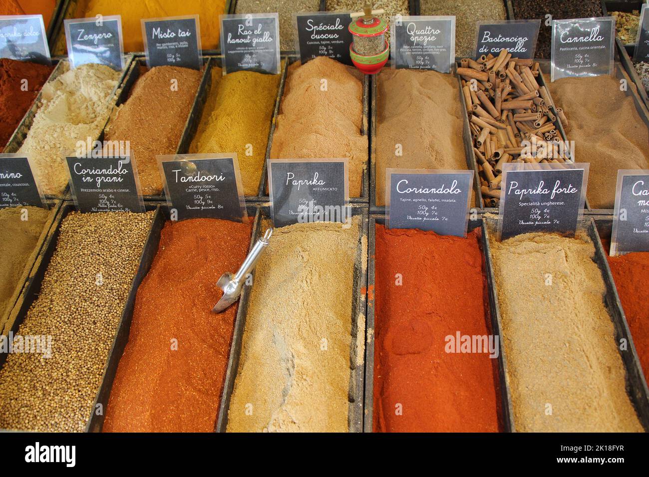 Different spices and dried vegetables at the street market Stock Photo