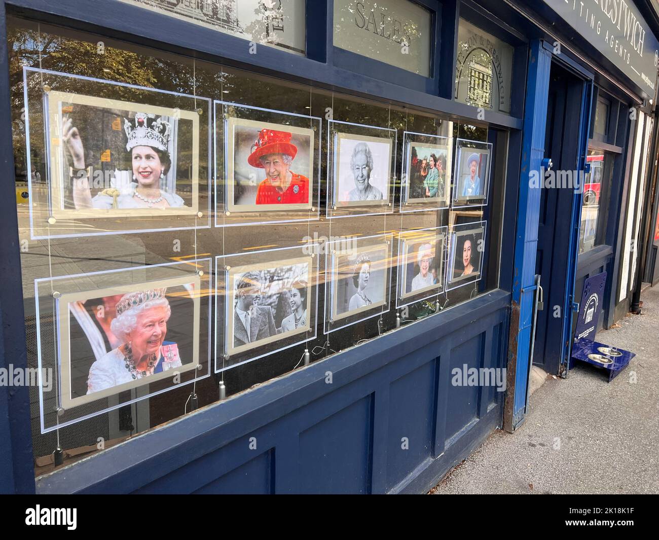 Estate agents windows in Wanstead , East London display photographs of the Queen in memory of