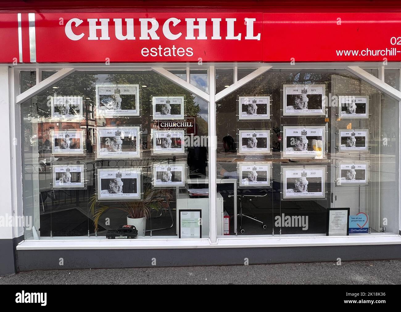 Estate agents windows in Wanstead , East London display photographs of the Queen in memory of