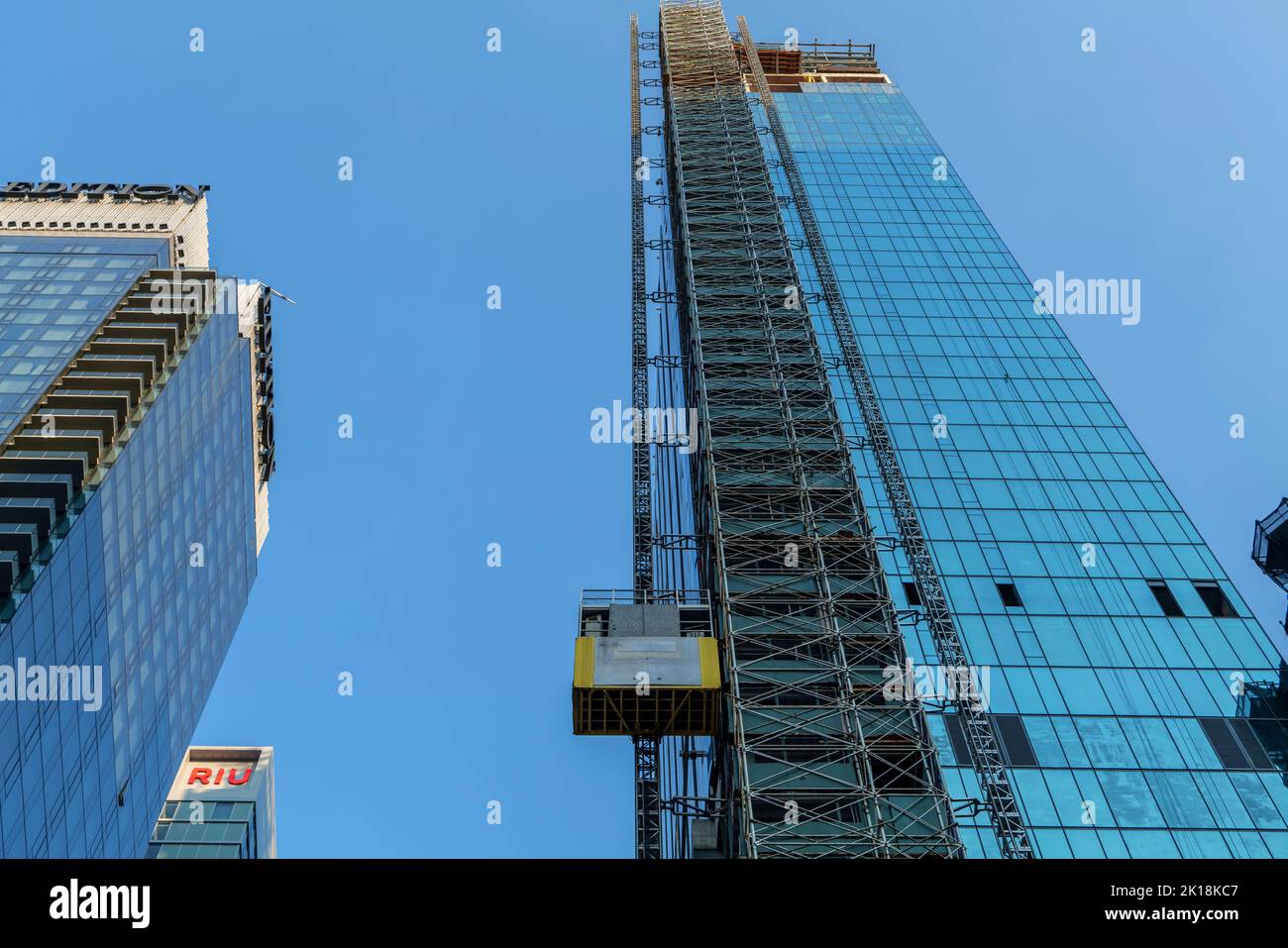 Elevator lifts for workers and materials at the construction site of a