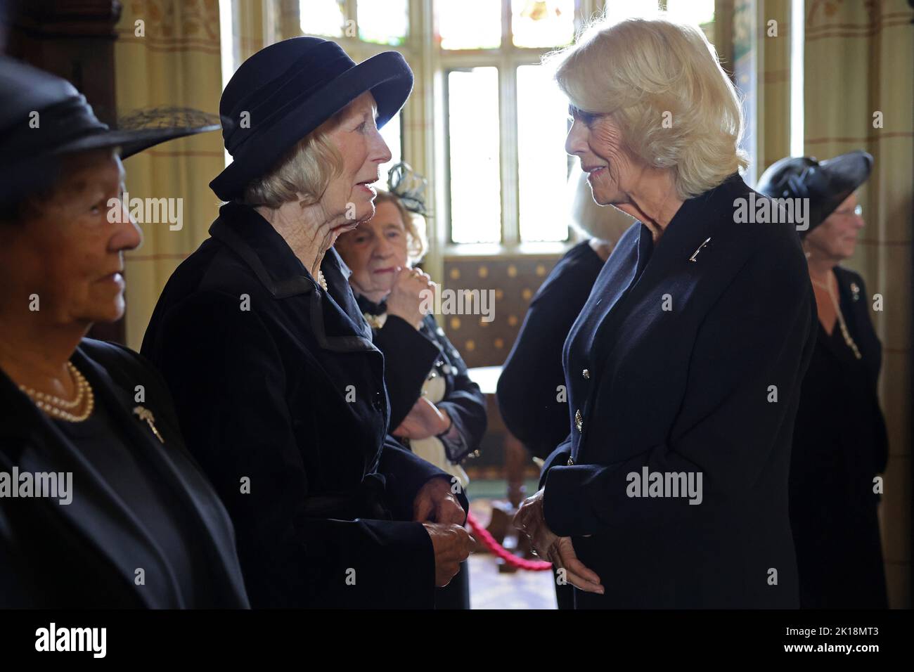 The Queen Consort speaks to the wives of victims of the Aberfan disaster during a reception for local charities at Cardiff Castle in Wales. Picture date: Friday September 16, 2022. Stock Photo