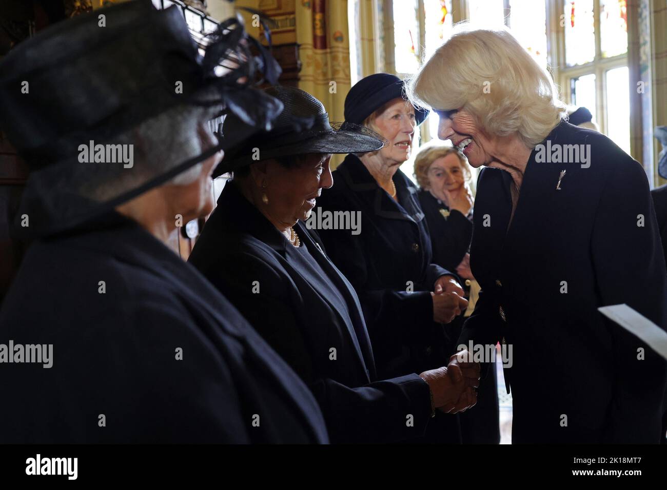 The Queen Consort speaks to the wives of victims of the Aberfan disaster during a reception for local charities at Cardiff Castle in Wales. Picture date: Friday September 16, 2022. Stock Photo