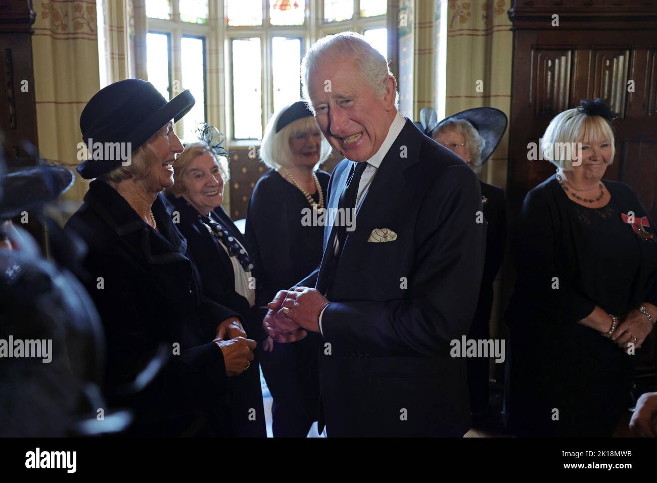 King Charles III speaks to the wives of victims of the Aberfan disaster during a reception for local charities at Cardiff Castle in Wales. Picture date: Friday September 16, 2022. Stock Photo