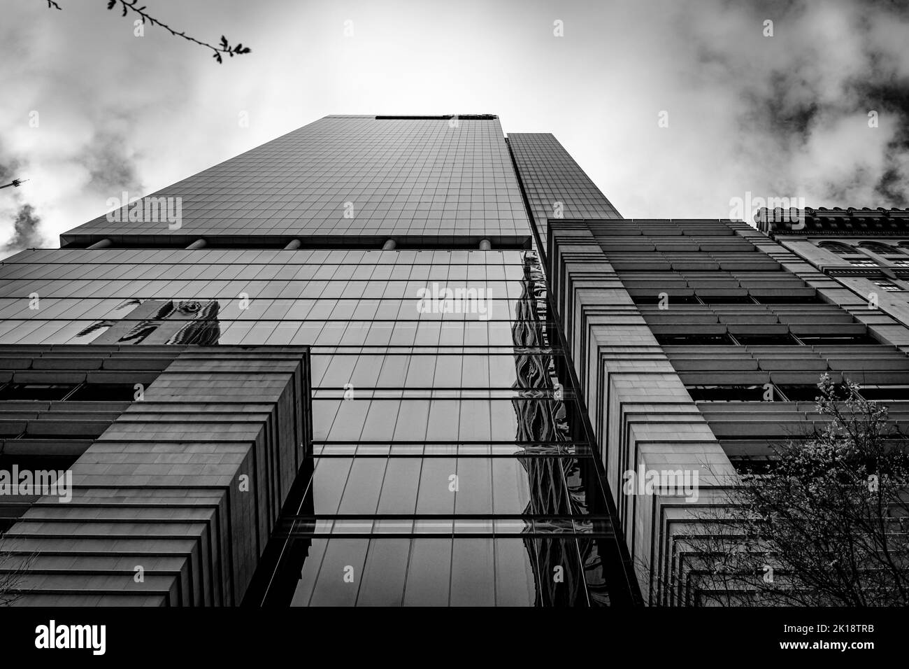A low angle grayscale shot of a modern architectural building in Sydney