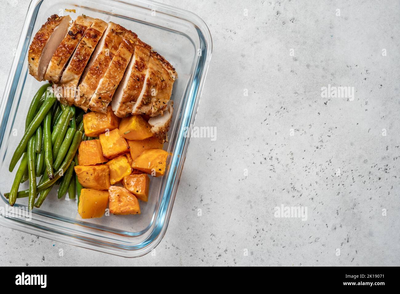 Grilled chicken breast with green beans and sweet potato Stock Photo