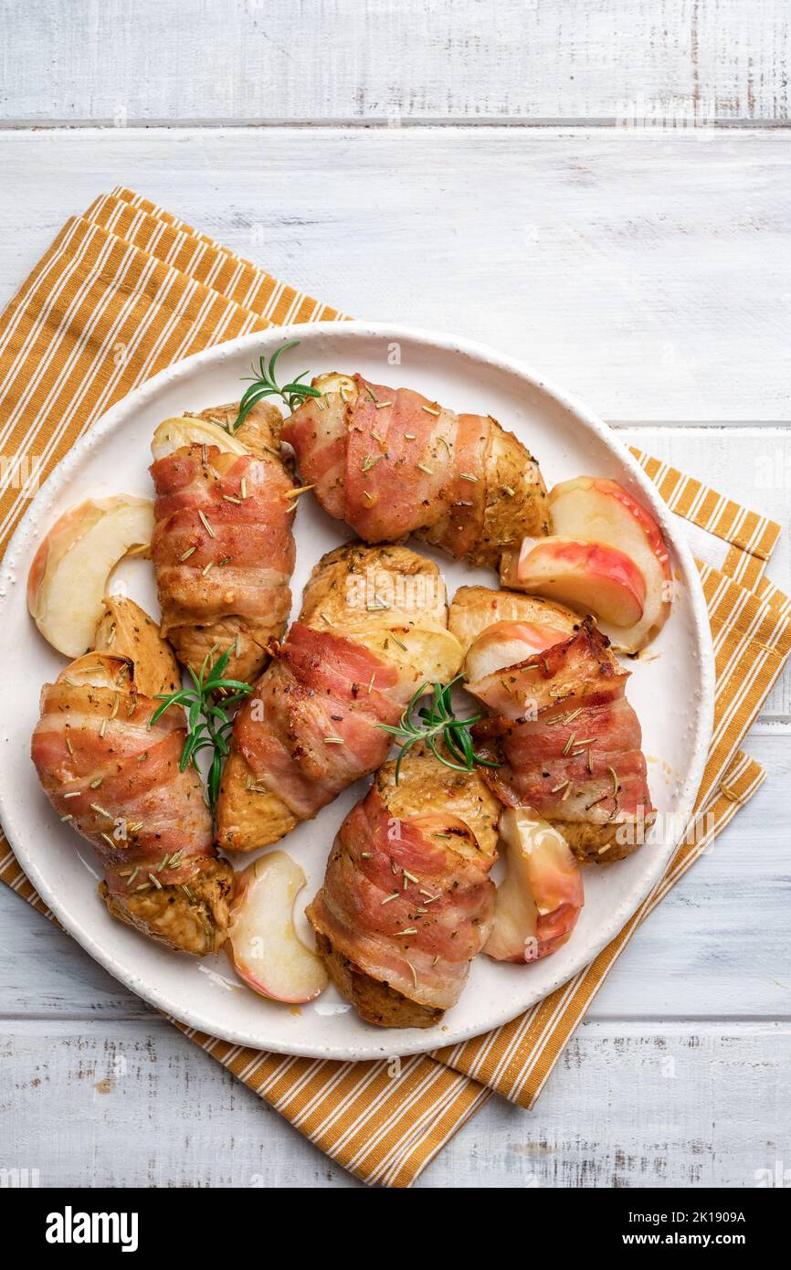Bacon wrapped turkey with apple Stock Photo