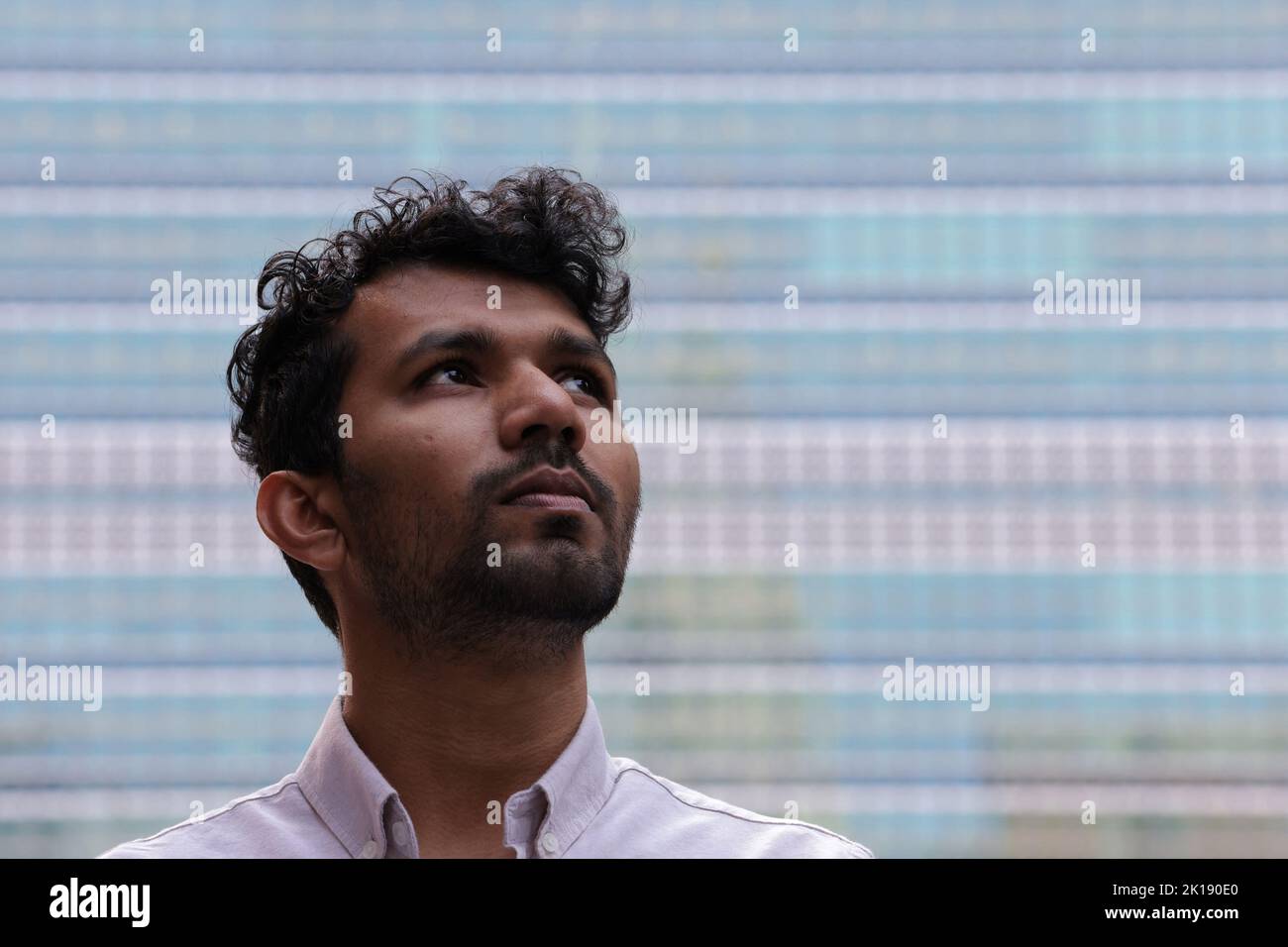 Vishal Prasad, a campaigner with the Pacific Islands Students Fighting Climate Change from Fiji, poses outside the United Nations Headquarters in Manhattan, New York City, U.S., September 16, 2022.  REUTERS/Andrew Kelly Stock Photo