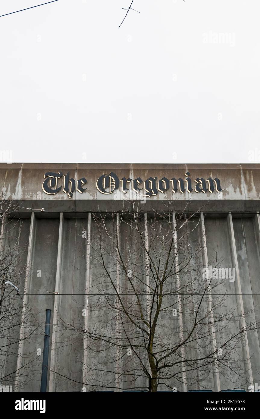 The top of the old Oregonian Printing Press Building on a rainy day on
