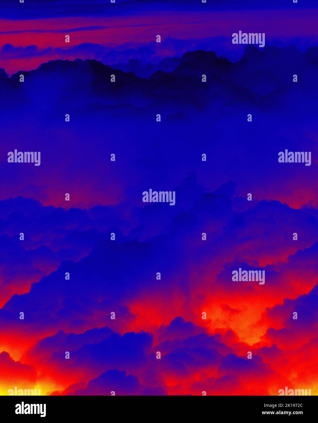 Colored clouds. Cloudscape under the wing of an airplane. Illustration of thermal image, thermal impressionism. Stock Photo