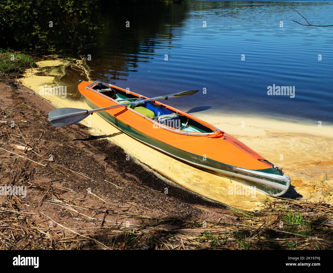 Kayak on the river bank. Kayaking as an active summer vacation Stock Photo