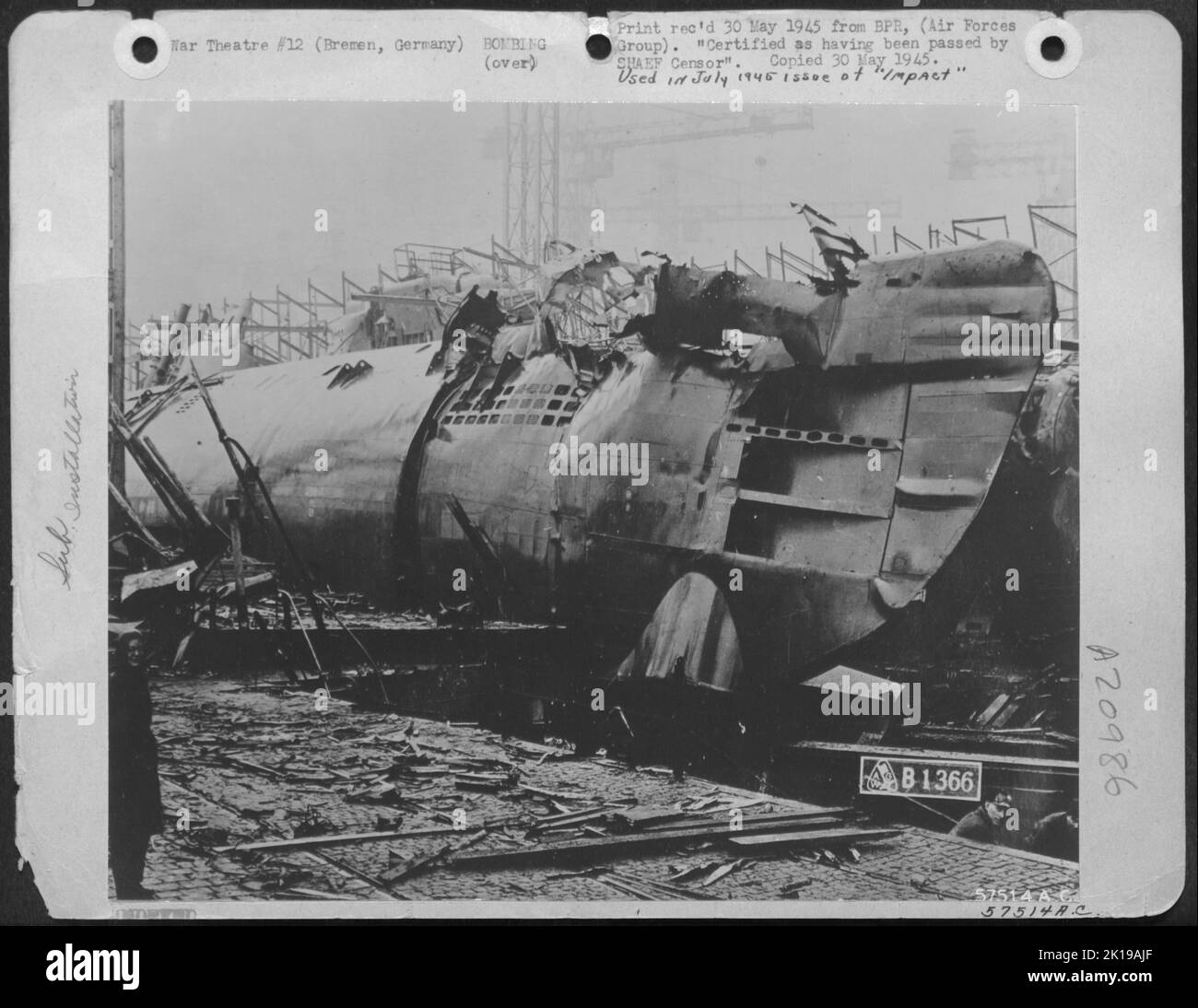 Carrying The Stamp Of The Official Photographer Of Deshimag'S Bremen Shipyards, This Photo Of A U-Boat Bombed While Undergoing Assembly, Shows Punctured Ballast Tanks. Note The Smooth Welded Seams Of The New Snorting U-Boat - So Called Since It Was Fitte Stock Photo