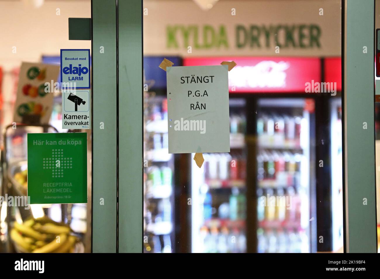 Robbery at gas station. With a sign at the entrance that the gas