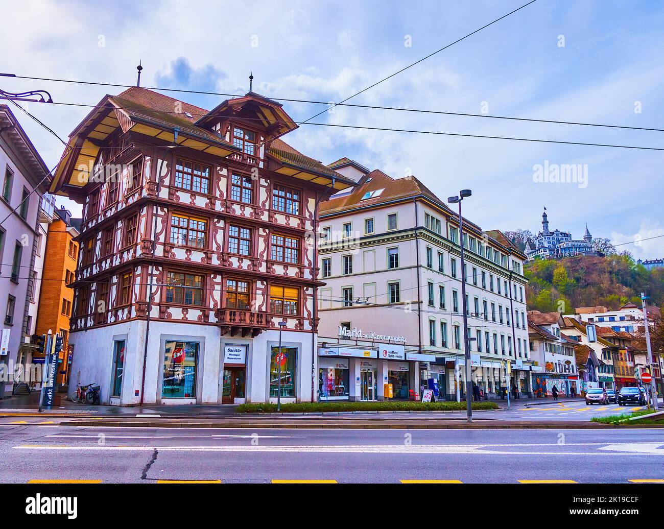 LUCERNE, SWITZERLAND - MARCH 30, 2022: Picturesque half-timbered townhouse on Kasernenplatz, on March 30 in Lucerne, Switzerland Stock Photo