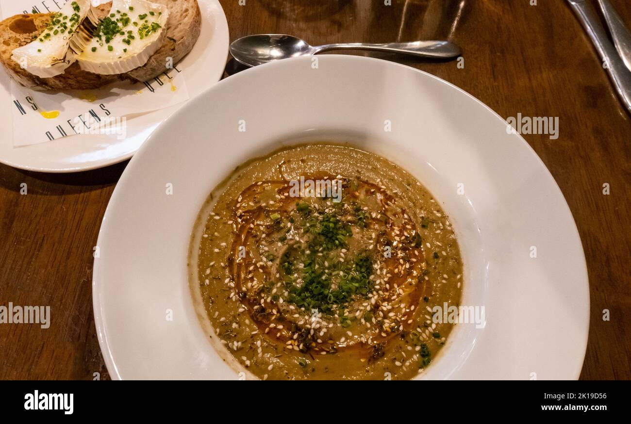 Aubergine soup and goat cheese on toast at Queens Bar & Bistro in Liverpool Stock Photo
