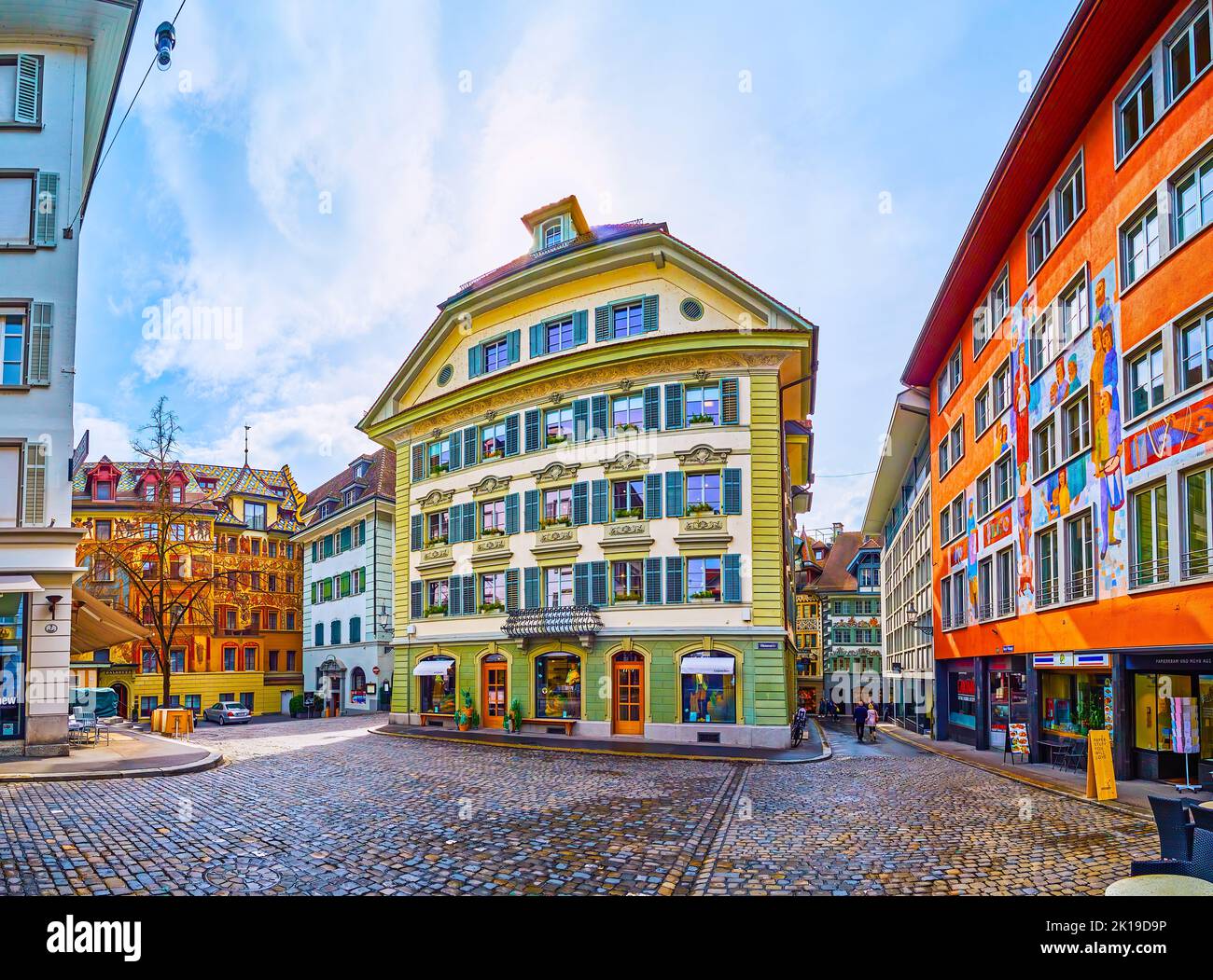 LUCERNE, SWITZERLAND - MARCH 30, 2022: Gorgeous medieval buildings on Weinmarkt square the former commercial center of the city, on March 30 in Lucern Stock Photo