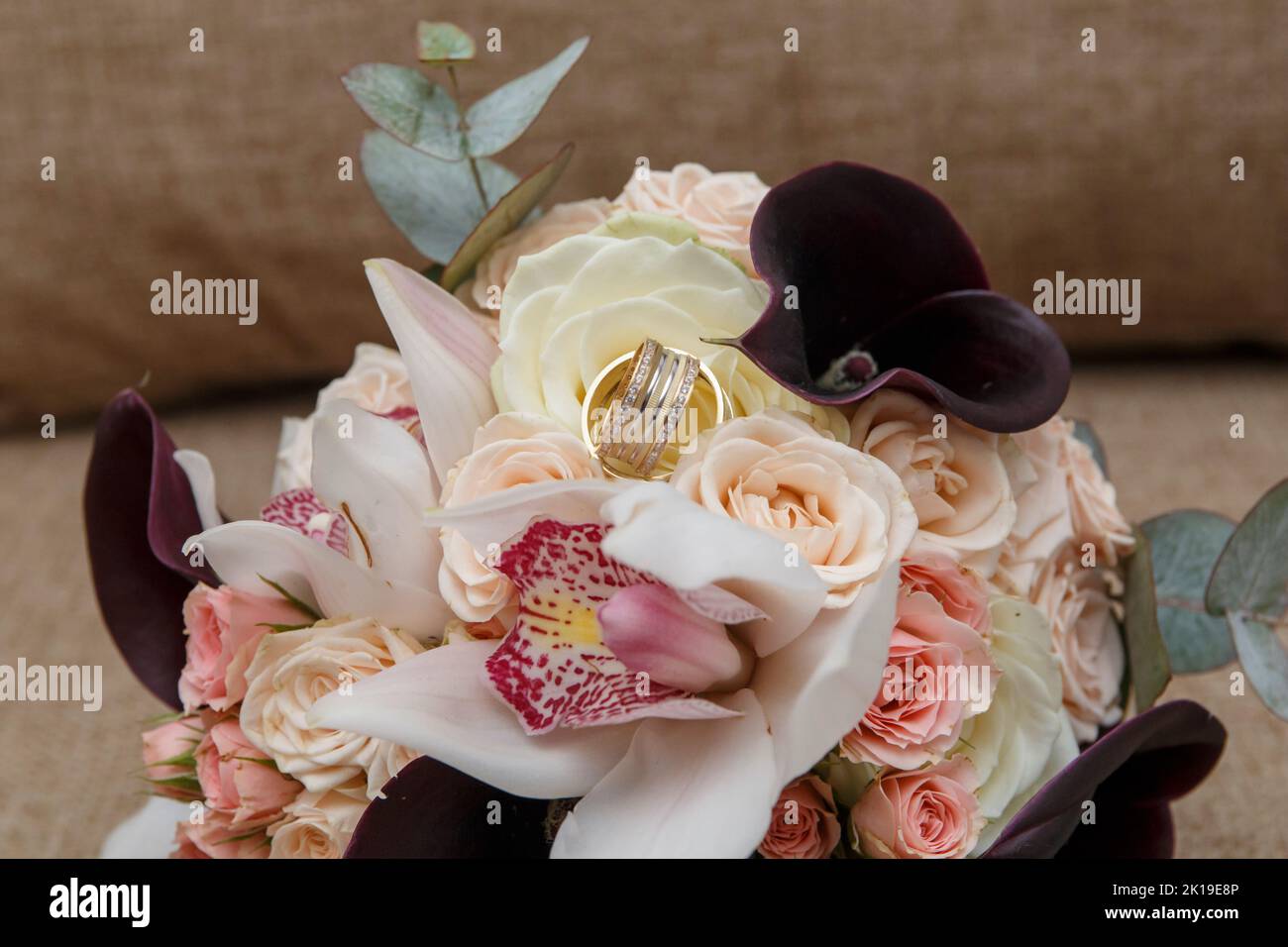 Wedding bouquet and rings closeup Stock Photo
