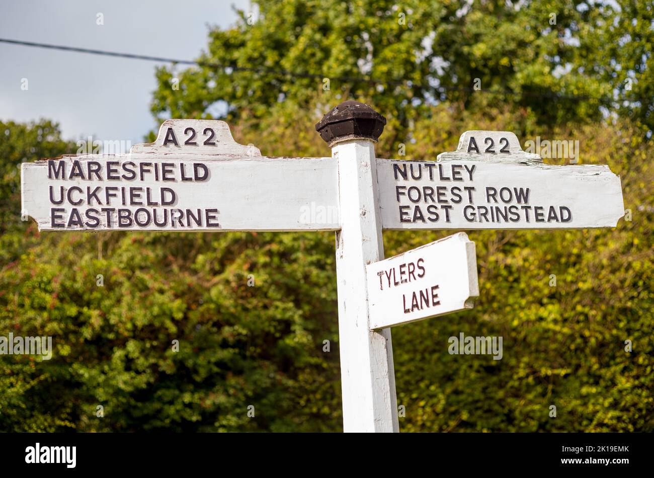 Sign post and directions on A22 road between East Grinstead and
