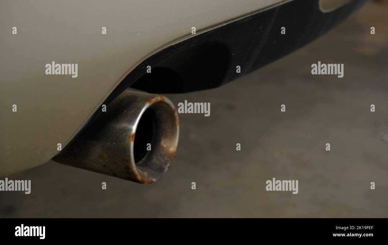 combustion fumes coming out of car exhaust pipe Stock Photo Alamy