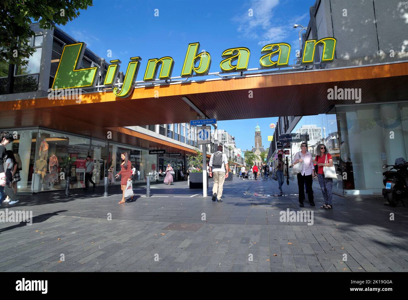 The Lijnbaan shopping area in Rotterdam, The Netherlands. (Looking towards the clock tower of Rotterdam City Hall.) Stock Photo