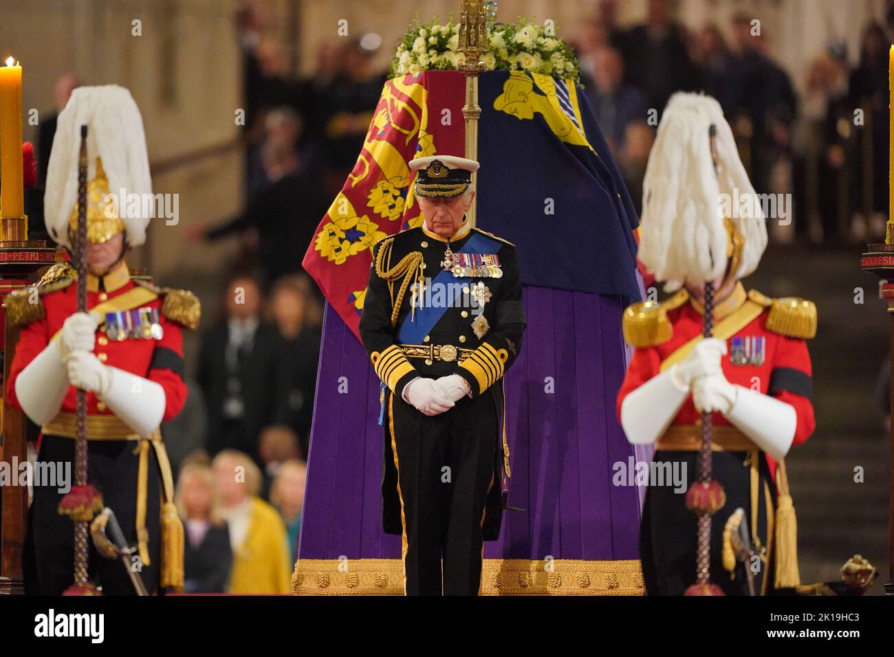 King Charles III stands vigil beside the coffin of his mother, Queen Elizabeth II, as it lies in state on the catafalque in Westminster Hall, at the Palace of Westminster, London. Picture date: Friday September 16, 2022. Stock Photo