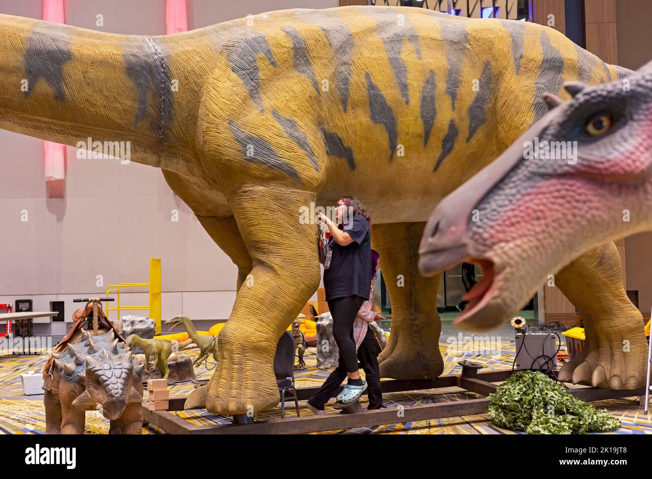Detroit, Michigan, USA. 15th Sep, 2022. Workers from Ultimate Fun Productions stitch together dinosaurs that will be displayed during the Detroit Auto Show. Credit: Jim West/Alamy Live News Stock Photo