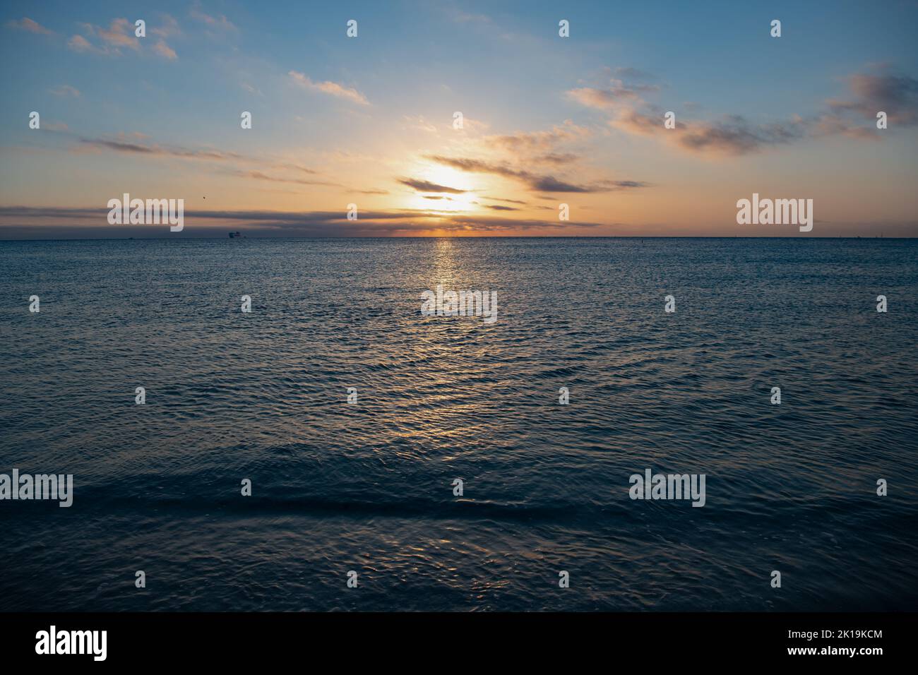beautiful evening sky with sea water on the summer beach Stock Photo ...