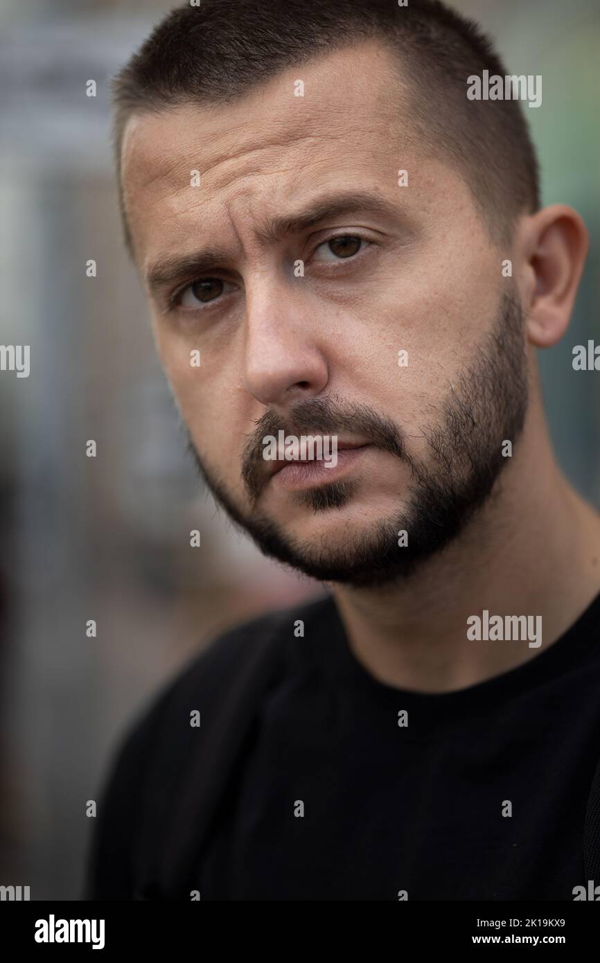 Portrait of sad young adult caucasian man Stock Photo