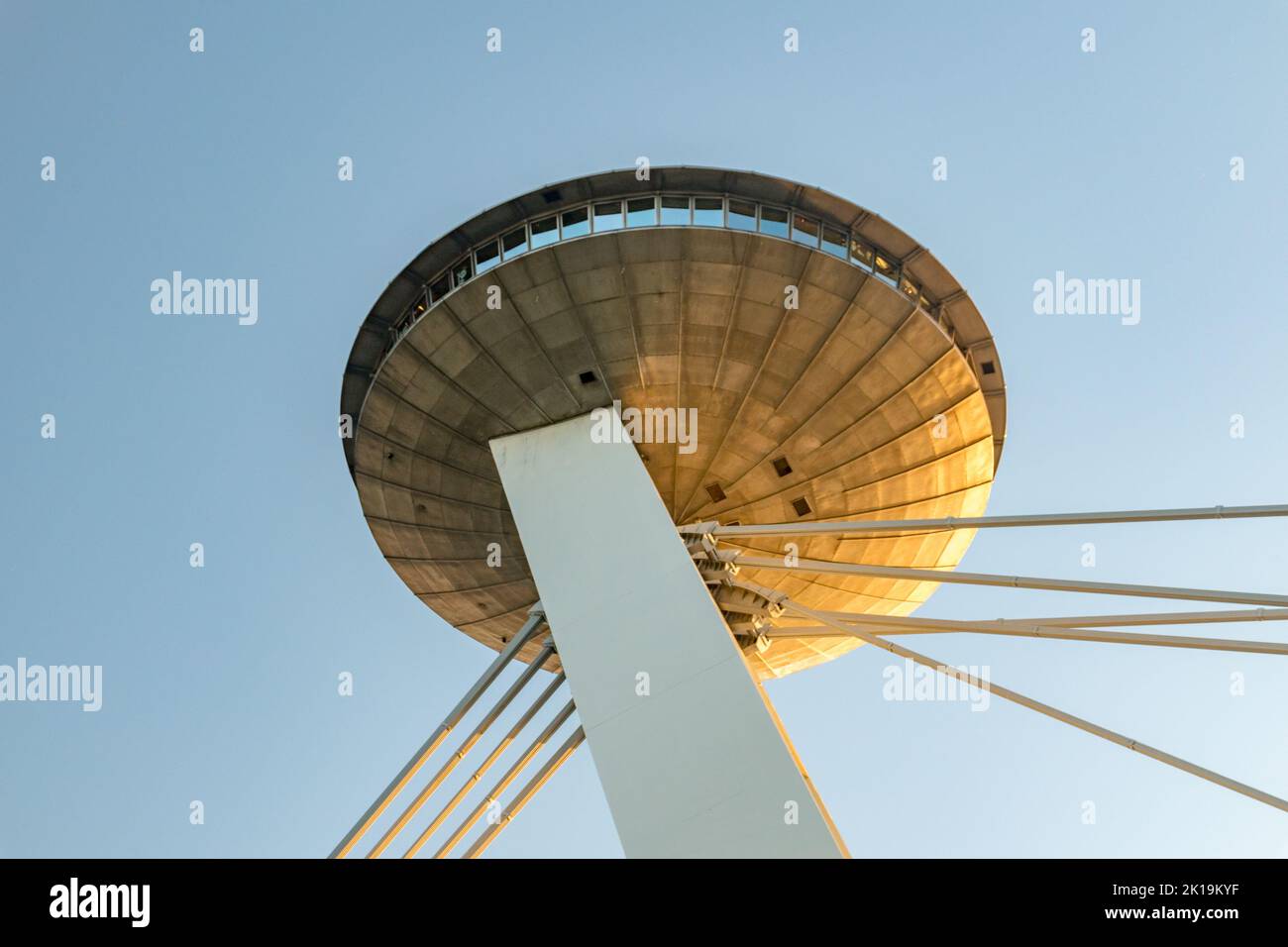 Bratislava, Slovakia - May 31, 2022: UFO observation deck at sunset time. UFO observation deck on the top of Slovak National Uprising bridge in Bratis Stock Photo