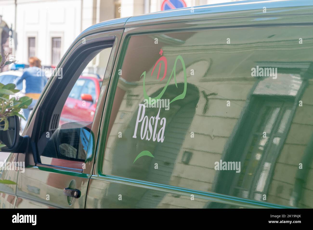 Szombathely, Hungary - June 1, 2022: Logo and sign of Hungarian post (Posta) on green car. Stock Photo