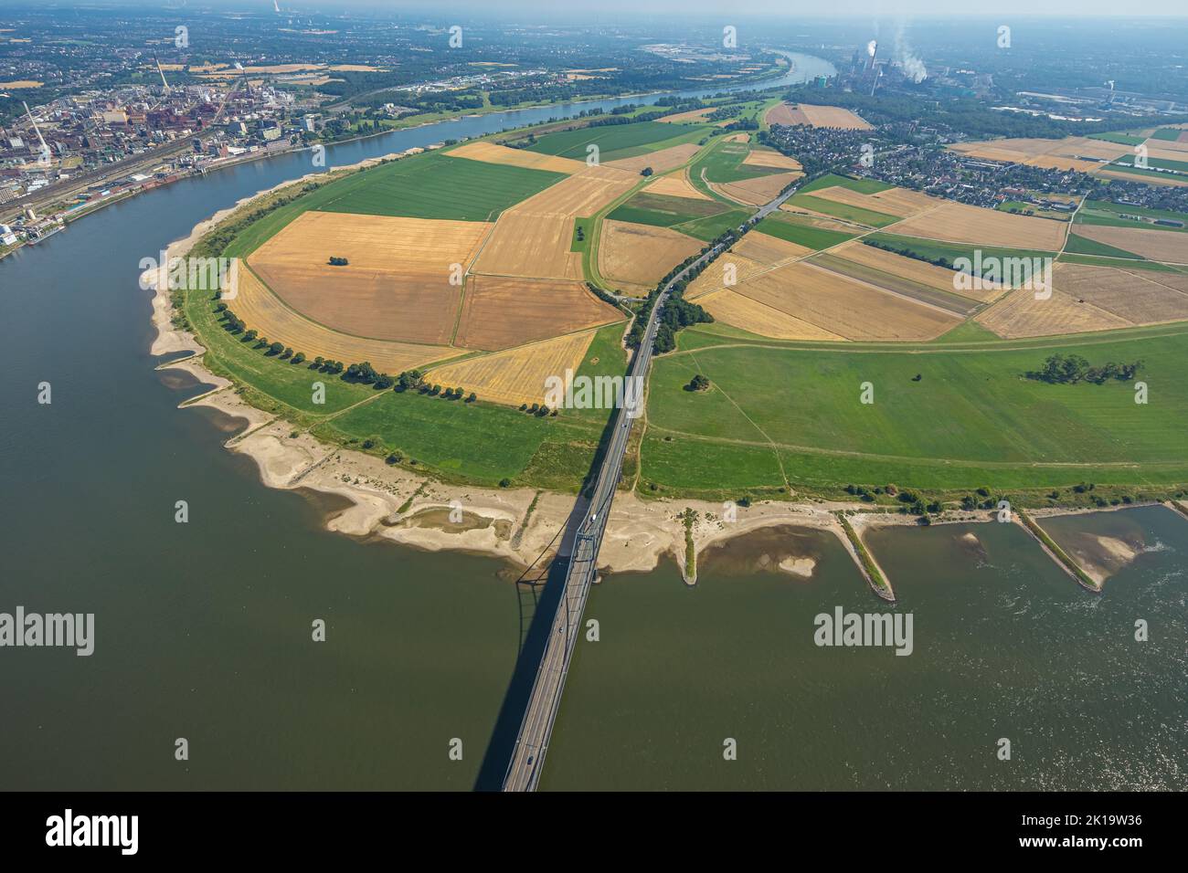 Aerial view, Krefeld-Uerdinger bridge, over the river Rhine, meadows and fields with view to Mündelheim, Duisburg, Ruhr area, North Rhine-Westphalia, Stock Photo