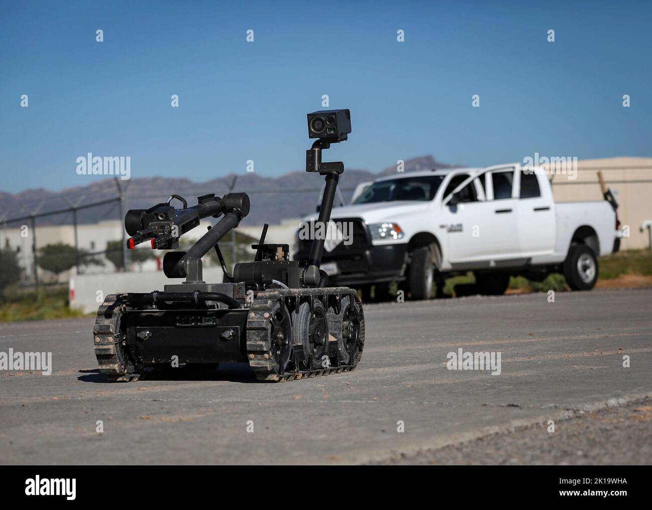A Man Transportable Robotic System - Increment II robot, piloted by a 741st Ordnance Company (EOD) Soldier from a safe distance, works its way toward a simulated bomb site during a training event at Fort Bliss, Texas, Sept. 14, 2022. Team Bliss and its partners regularly hold installation exercises to stay sharp when it comes to swift and effective emergency response. Stock Photo