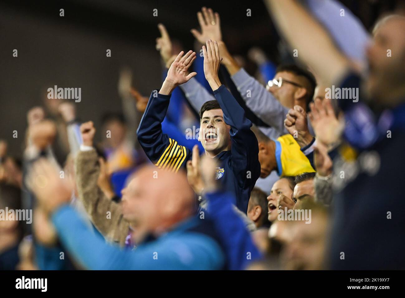 Leeds Rhinos fans celebrate Wigans try ruled out by there TMO during the Betfred Super League match Wigan Warriors vs Leeds Rhinos at DW Stadium, Wigan, United Kingdom, 16th September 2022  (Photo by Craig Thomas/News Images) Stock Photo