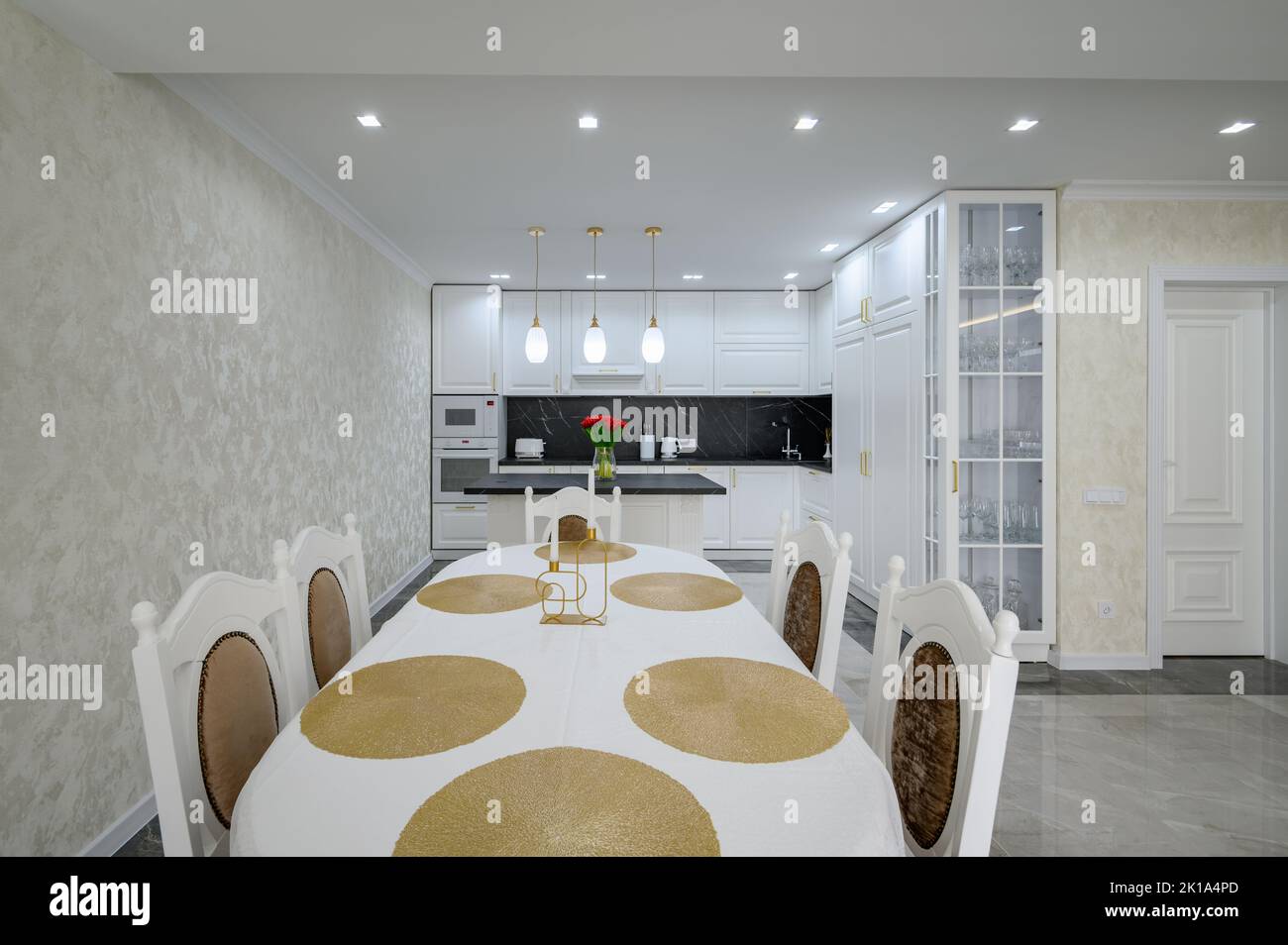Luxurious large modern domestic kitchen with marble floor Stock Photo