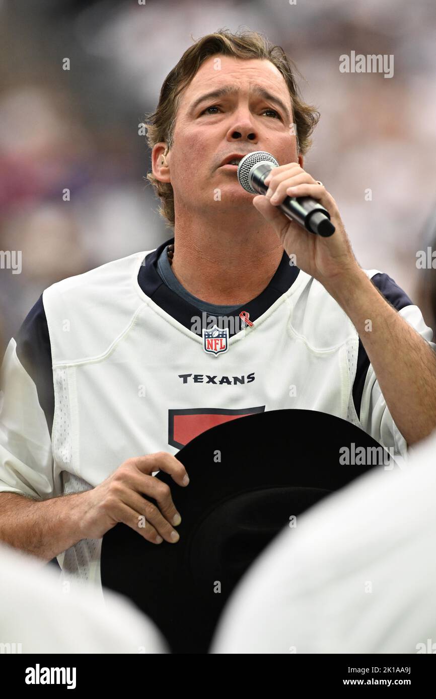 Multi-platinum recording artist Clay Walker sings the Nation Anthem prior to the NFL football game between the Indianapolis Colts and the Houston Texa Stock Photo